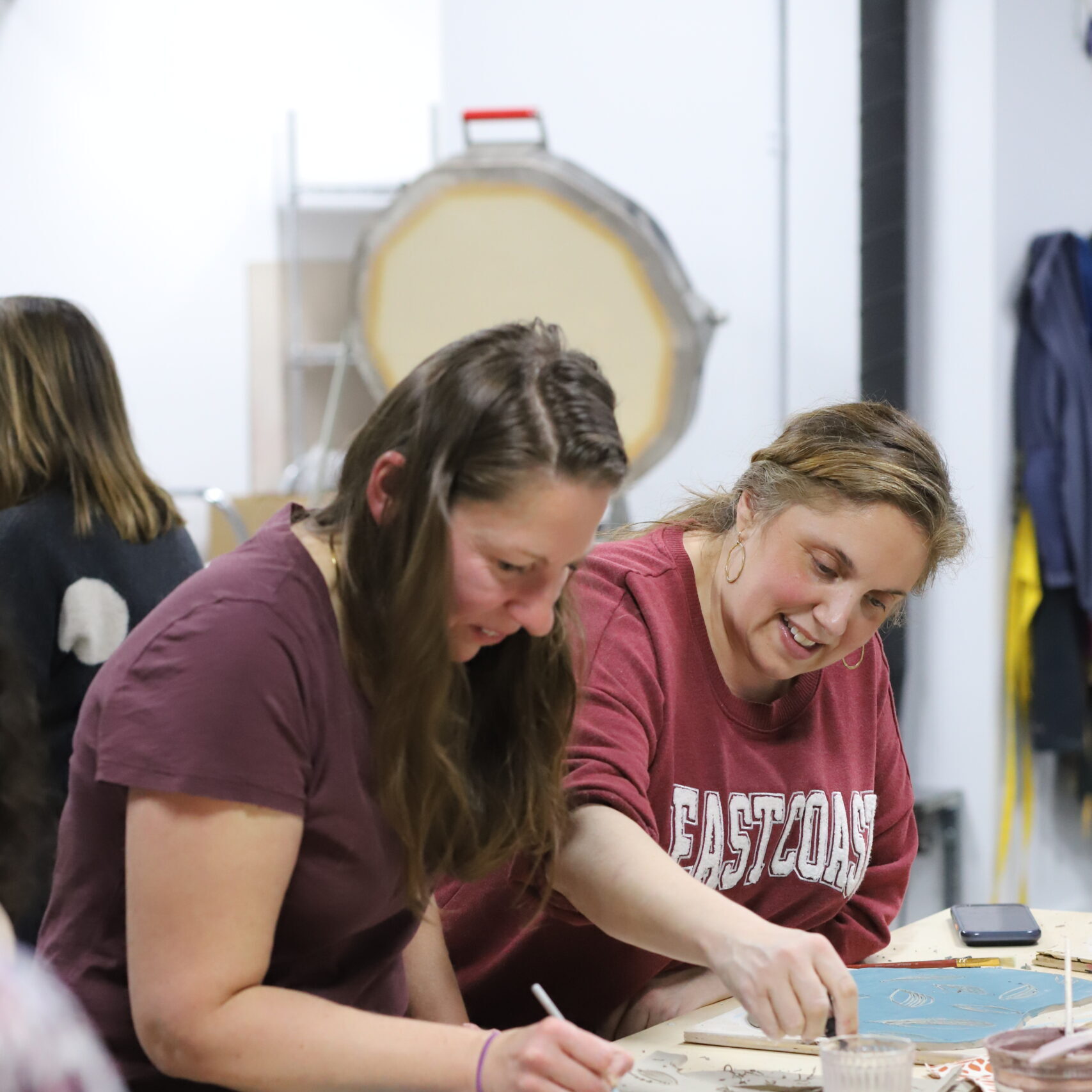 hands-on, one-time pottery workshops where guests create custom, functional charcuterie boards from raw clay