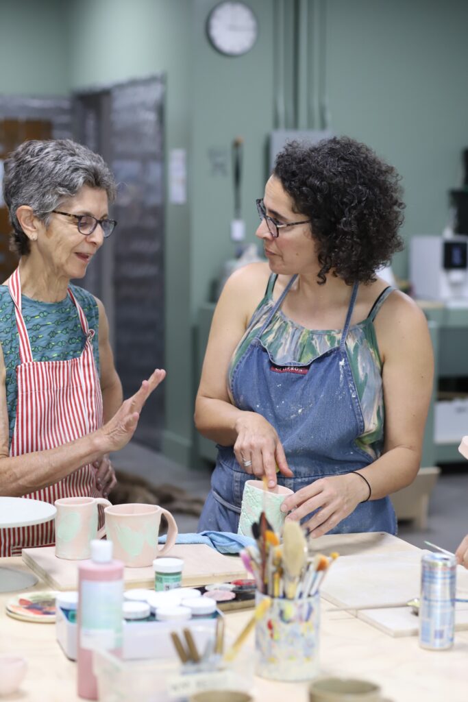 Ariella_working_with_student_at_slip_Studio